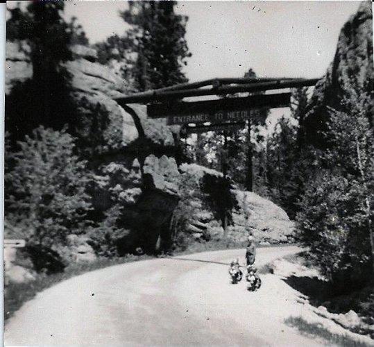 Dad at entrance to Needles 1953.JPG