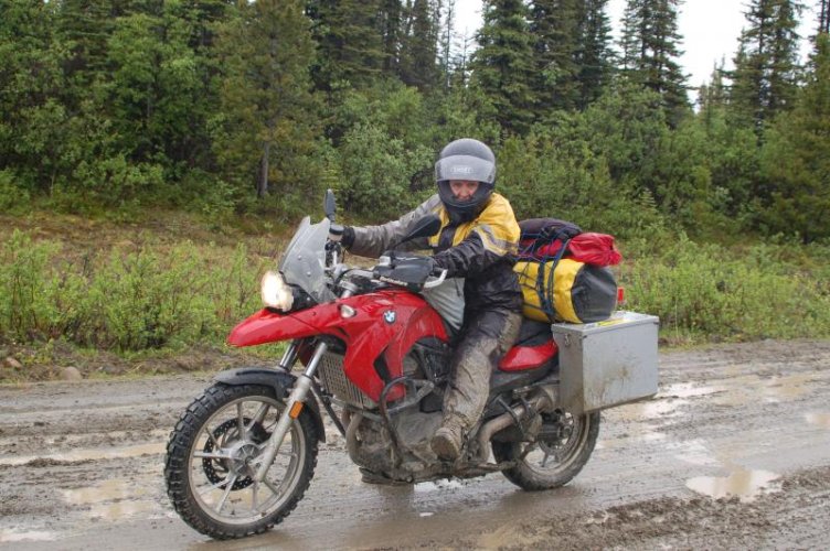 Stacie in mud Canol Road.jpg